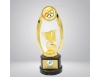 The trophy statue has a golden frame on either side