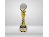 Golden statue of a hand with a ball