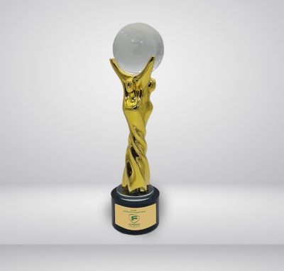 Golden statue of a hand with a ball