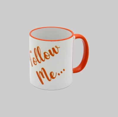 Orange handle white mug